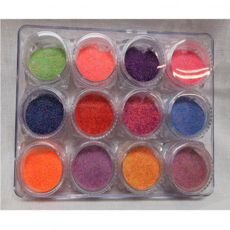 Caja surtido de polvo arena decoración.